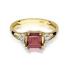 Pierścionek złoty 585 z brylantami 0,06ct granatem 1,30ct W-40B
