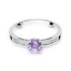 Pierścionek złoty 585 oliwin 0,60ct brylantami 0,05ct W-66