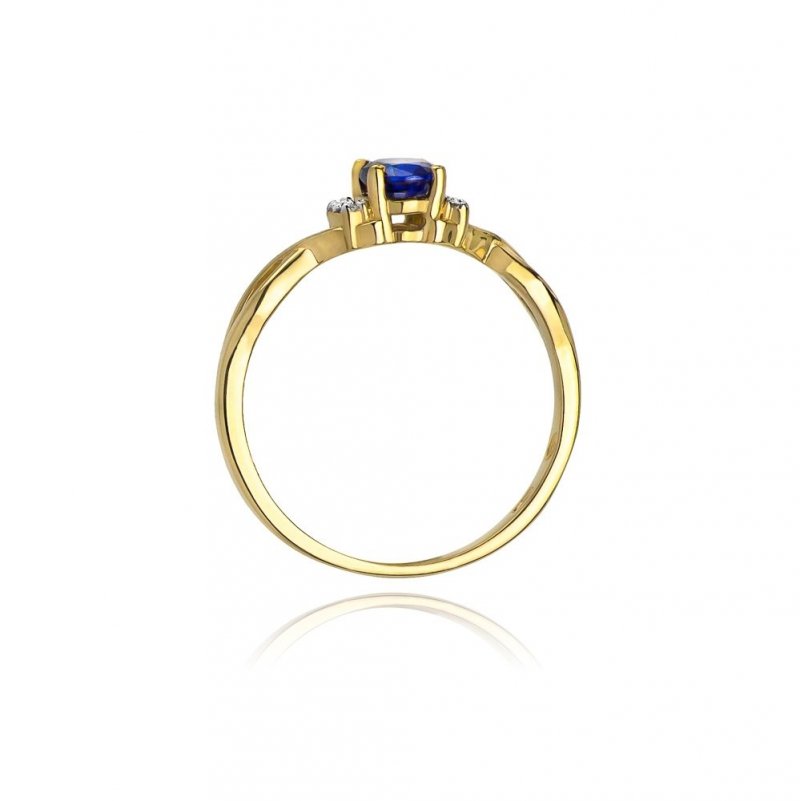 Pierścionek złoty 585 z brylantami 0,05ct tanzanitem 0,40ct W-19