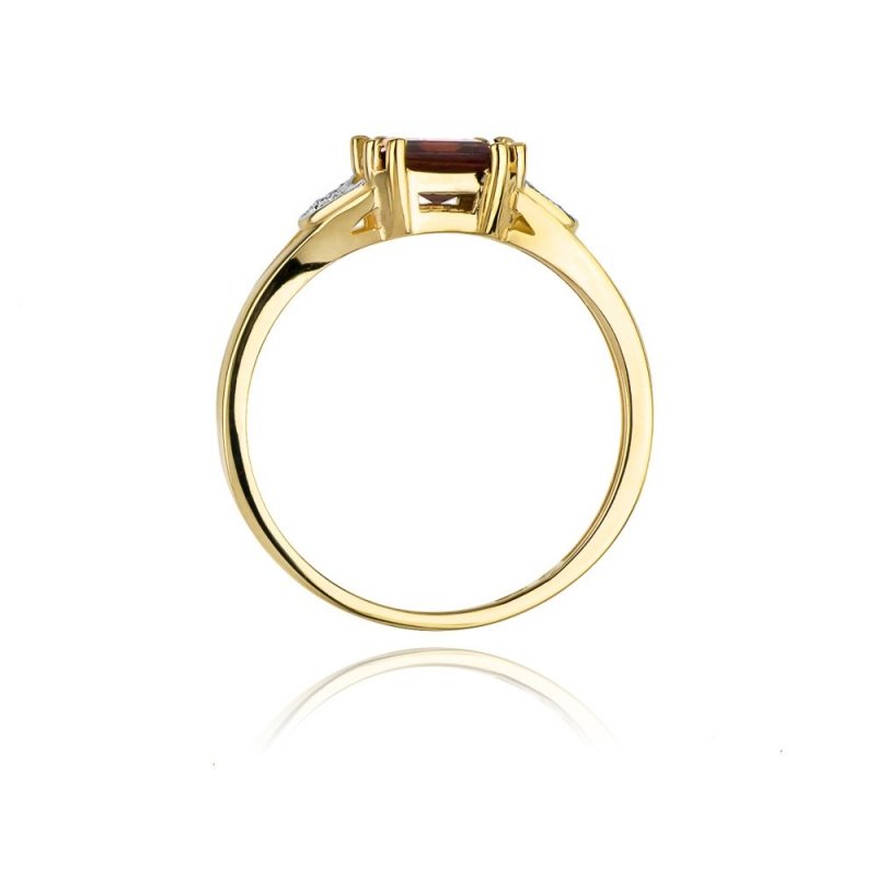Pierścionek złoty 585 z brylantami 0,06ct granatem 1,30ct W-40B