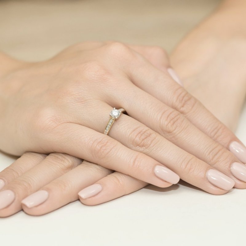 Pierścionek złoty 585 z brylantem 0,36ct zaręczynowy W-52