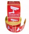 Etykieta ostrzegawcza PAKOWANE PRZY KAMERACH 55x55mm papierowa na roli (1000szt) BULK