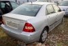Zamek drzwi tył lewy Toyota Corolla E12 2002 Sedan