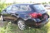 Zamek drzwi przód prawy Opel Astra J 2011 Kombi