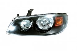 Reflektor lewy Nissan Almera N16 Lift 2003-2006 (czarny)