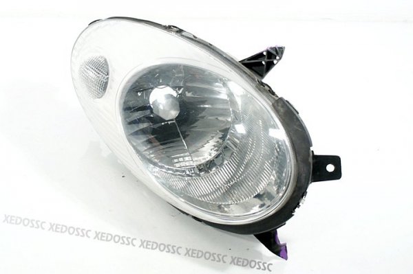 REFLEKTOR LEWY NISSAN MICRA K12 2003-2007