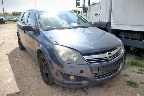 Błotnik przód prawy Opel Astra H 2010 Kombi (kod lakieru: GBI)