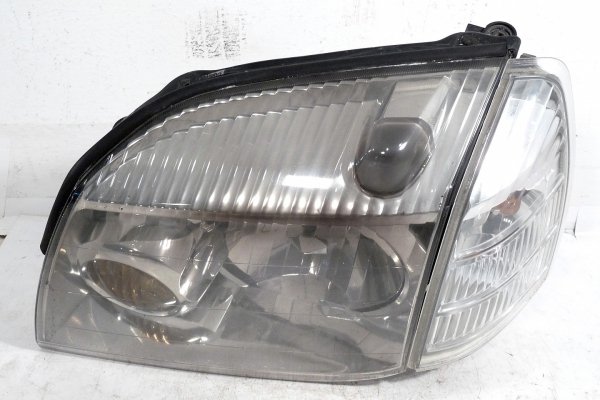 Reflektor lewy NIssan X-Trail T30 2001-2007