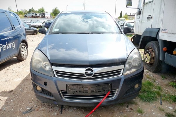Błotnik przód prawy Opel Astra H 2010 Kombi (kod lakieru: GBI)
