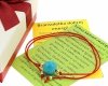 GOLDENES ARMBAND MIT EDELSTAHL