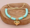 GOLDENES ARMBAND MIT EDELSTAHL
