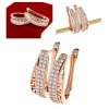 2489b Złote kolczyki cyrkonie pozłacane rose gold Xuping wiszące wzór grecki