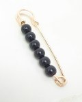 elegant gold brooch