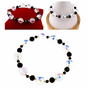 1914j Bransoletka złota stal chirurgiczna 316L na gumce kryształki