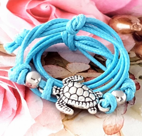 GOLDENES ARMBAND MIT EDELSTAHL