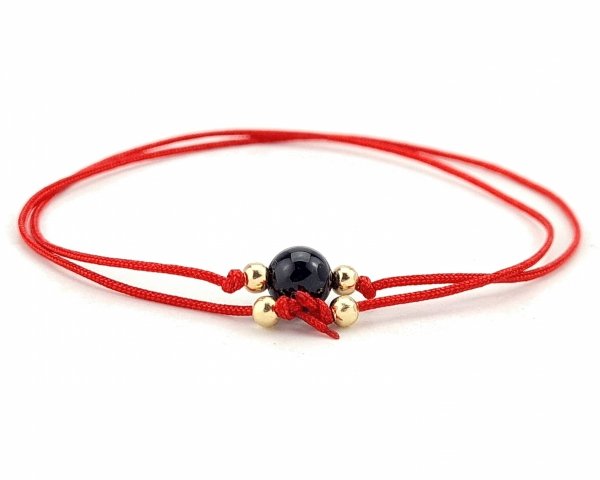 GOLDENES ARMBAND MIT EDELSTAHL