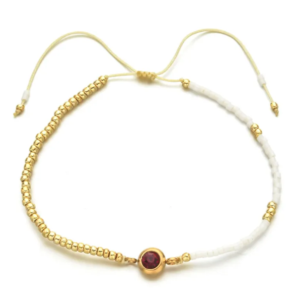 GOLDENES ARMBAND MIT EDELSTAHL
