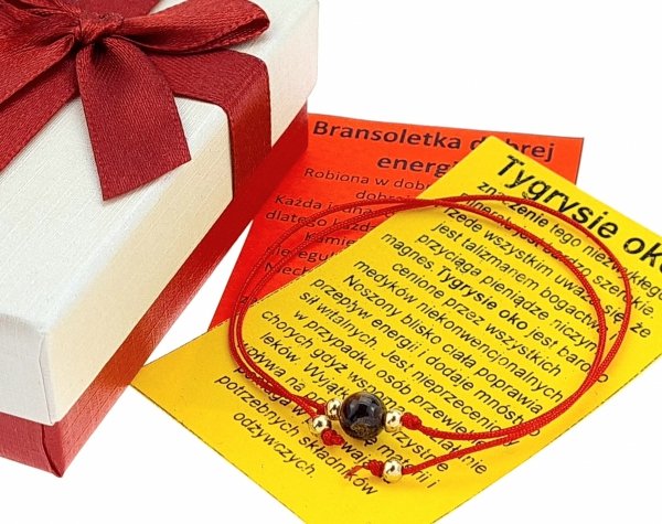 GOLDENES ARMBAND MIT EDELSTAHL