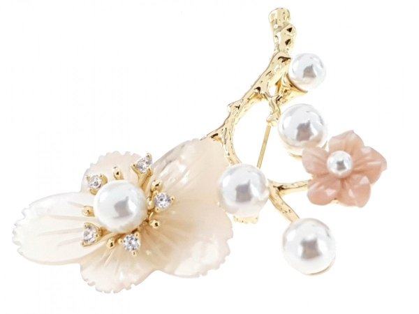 elegant gold brooch