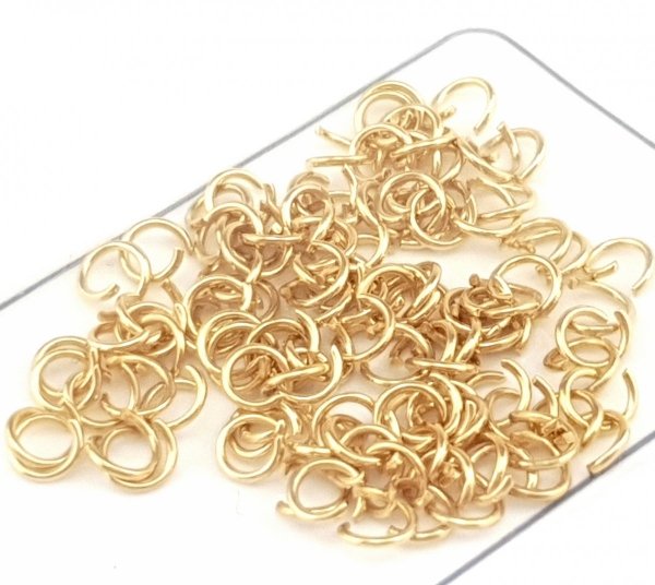 832 Kółeczka stal chirurgiczna 200 sztuk 7x1mm złote otwarte 