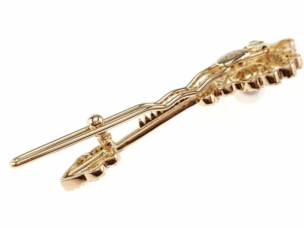 411 Elegancka broszka złota cyrkonia 