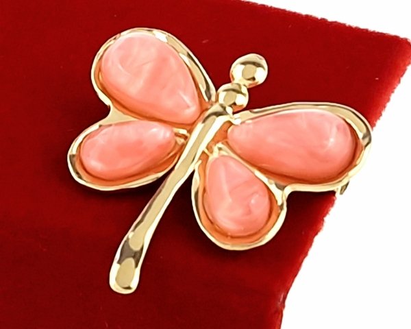 элегантная золотая брошь