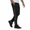 Długie Spodnie Dresowe Adidas Essentials Camo Print Czarny Mężczyzna