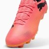 Buty Puma FUTURE 7 Play FG/AG 107723-03 różowy 42