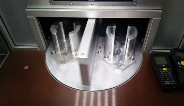 Laser cabinet for marking process with turntable