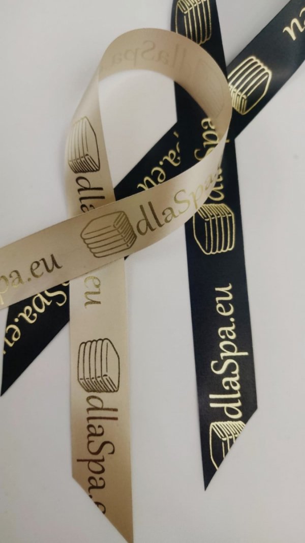 Wstążka złota ze złotym logo i wstążka czarna ze złoty logo