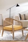 Komfortowy fotel Cairo z poduchą - drewno brzozowe, ratan, żółte poduszki