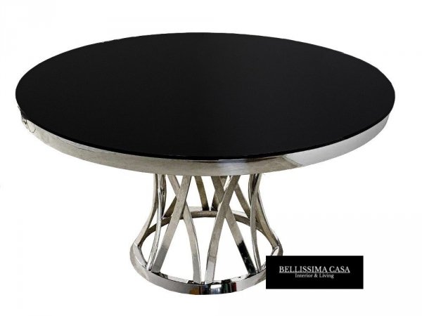 Okrągły stół z ciemnym blatem i dekoracyjną podstawą art deco