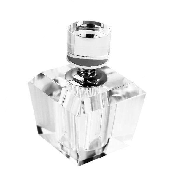 Klasyczny, prosty kształt i luksusowy materiał, jakim jest kryształ tworzą piękny flakon na perfumy.  