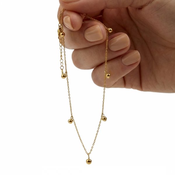 Bransoletka na nogę z wiszącymi kulkami złoto 585 