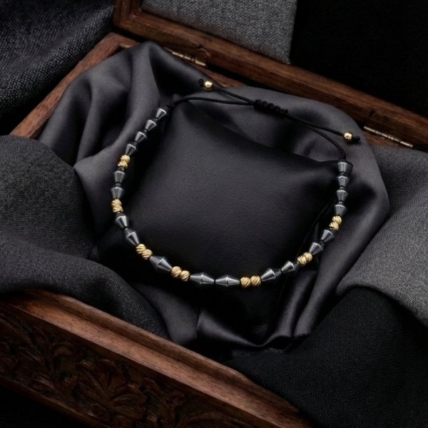 Bransoletka ze złotymi kulami i hematytem złoto 585 