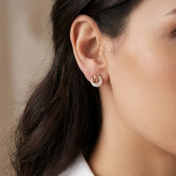 Kolczyki koła z kamieniami i kokardą złoto 585 