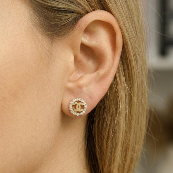 Kolczyki koła wysadzane kamieniami białymi złoto 585 