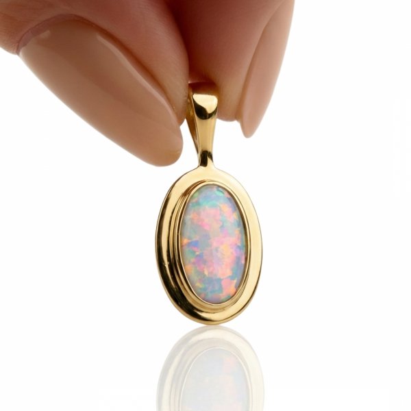 Wisior w owalnej oprawie z opalem złoto 585 