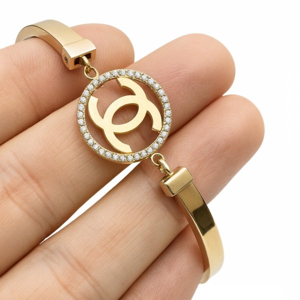 Bransoletka półsztywna litery złoto 585 