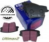 Tylne klocki Ultimax2 + NIE WENTYLOWANE tarcze hamulcowe EBC seria PREMIUM Chrysler 300C RWD V6
