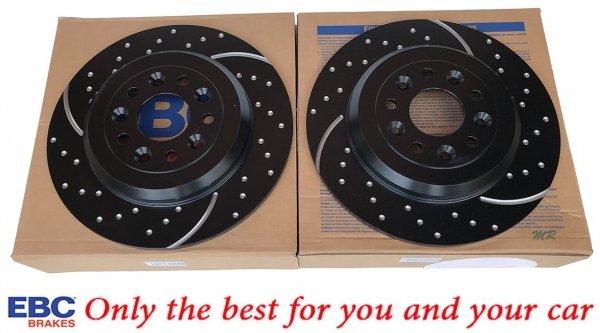 Tylne klocki Ultimax2 + NAWIERCANE NACINANE tarcze hamulcowe 330mm EBC seria GD Lincoln MKT 2010-2019