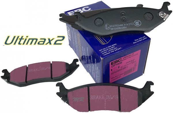 Tylne klocki Ultimax2 + nawiercone nacinane tarcze hamulcowe EBC seria GD Dodge RAM 1500 2003-