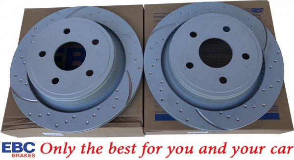 Tylne klocki Ultimax2 + nawiercone nacinane tarcze hamulcowe EBC seria GD Dodge RAM 1500 2003-