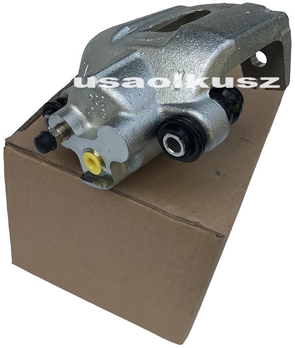 Zacisk hamulcowy tylny lewy Jeep Commander