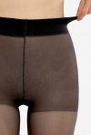 Rajstopy Gatta Comfort Style 20 Den to idealne rozwiązanie dla kobiet ceniących wygodę i klasyczny styl. Szeroki ściągacz i matowe wykończenie gwarantują elegancki wygląd.
