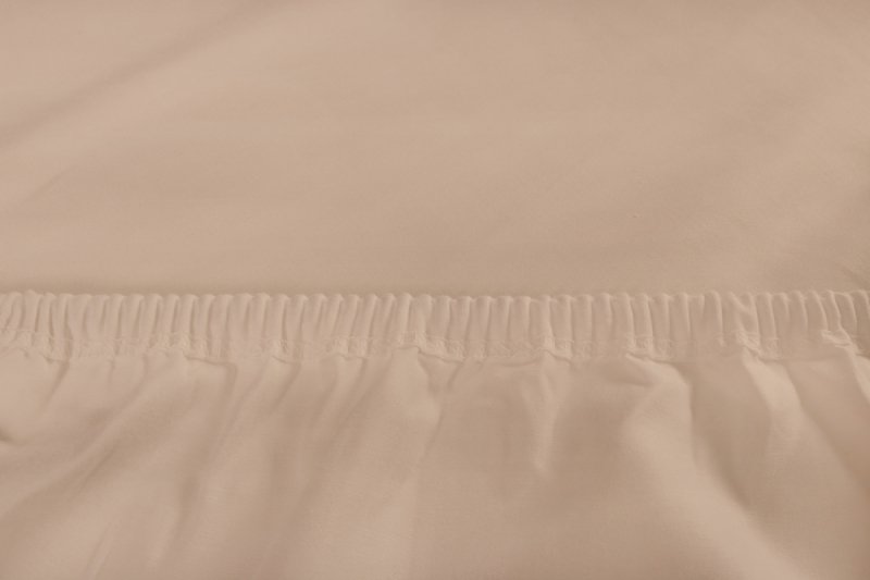 Prześcieradło PREMIUM jersey z lycrą na wysoki materac 180x200 z gumką wz. 16B beż