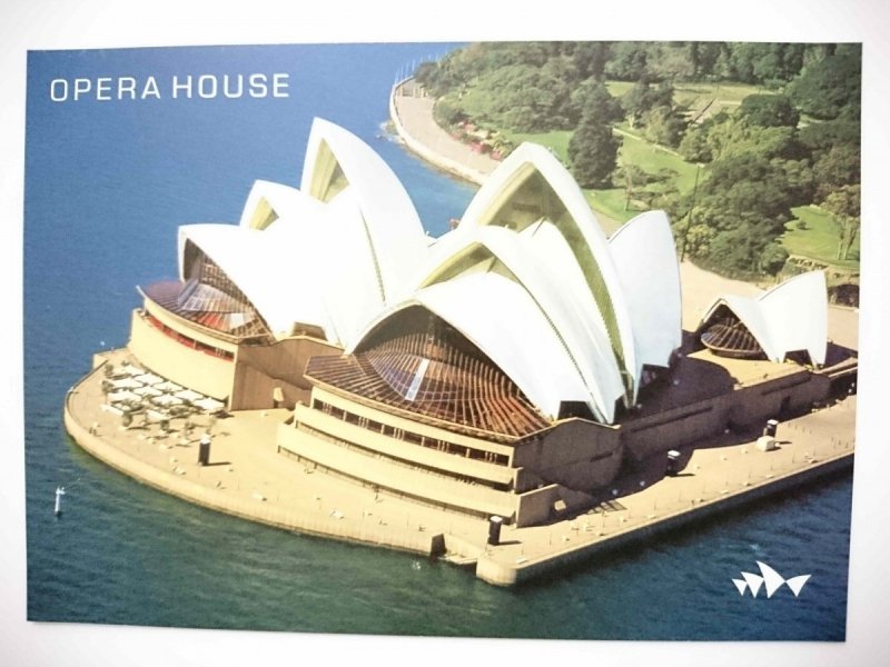 OPERA HOUSE. THIS CLOSE-UP AERIAL HIGHLIGHTS