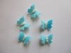 Motylki cukrowe na tort małe niebieskie 3D 5szt