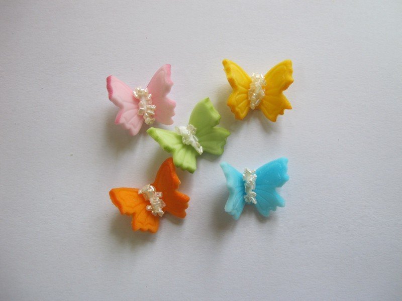 Motylki cukrowe na tort małe kolorowe 3D 100szt