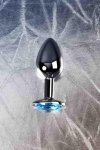 Silver anal plug TOYFA Metal,with a Topaz color gem